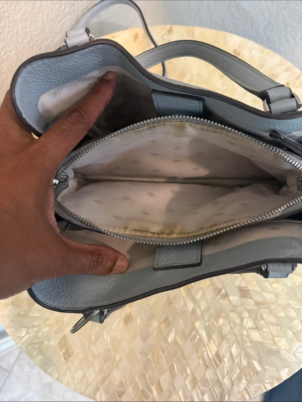 Kate Spade pale blue pebbled leather satchel with charm